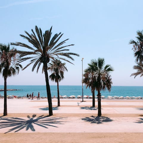 Spend sunny days on Barceloneta Beach, only minutes away on foot 