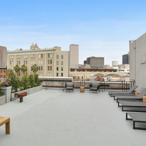 Relax with a drink on the rooftop terrace