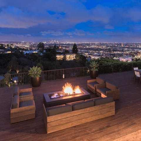 Finish the day around the fire pit, overlooking the bright lights of LA
