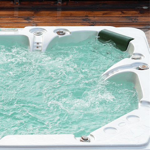 Soak in the hot tub after a long day of outdoor activities