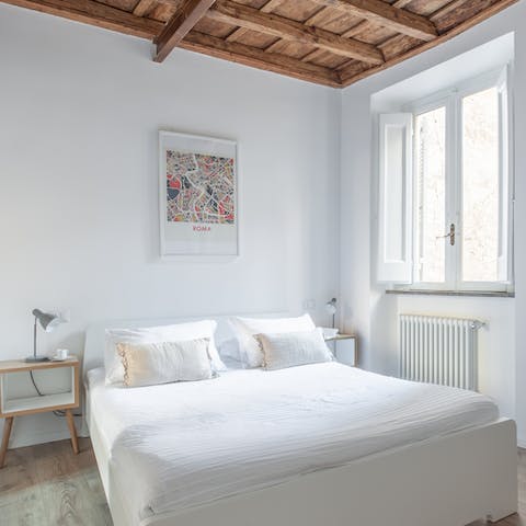 Wake up beneath the bedroom's beams, feeling rested and ready for another day of Rome exploring