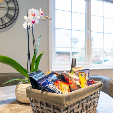 Nibble on snacks and enjoy the bottle of wine your host leaves in the welcome hamper