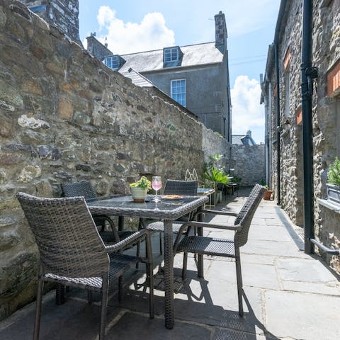 Indulge in an alfresco meal on the outdoor terrace