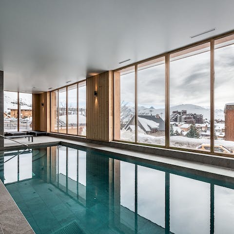 Enjoy a leisurely swim in the shared swimming pool, surrounded by gorgeous mountain views