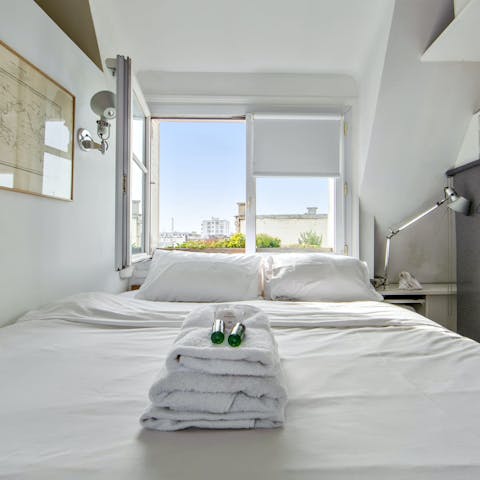 Wake up each morning to views of the Eiffel Tower in the distance