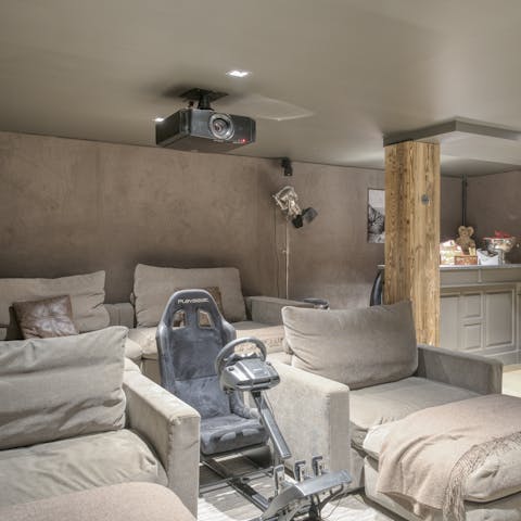 Gather for a family movie night in the cosy home cinema