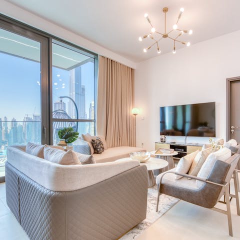 Snuggle up in the stylish and cosy living room and enjoy movie nights with your family and friends