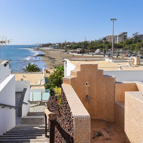 Rinse off in the outdoor shower after a day on the golden shores