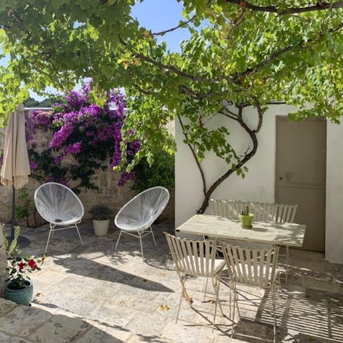 Savour a little seclusion while sitting in the colourful courtyard