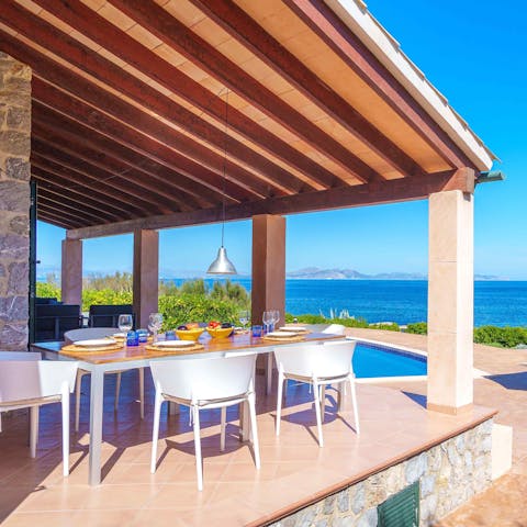 Tuck into a Mallorcan feast on the sunny terrace