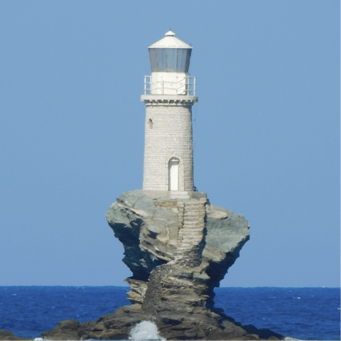 Head into Andros town and catch a glimpse of Tourlitis Lighthouse