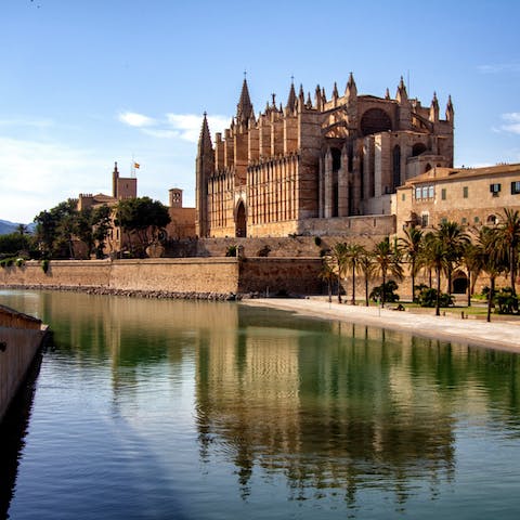 Wander around Palma's Old Town and end up outside the mighty gothic cathedral