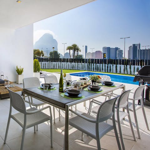 Dine alfresco on the covered patio