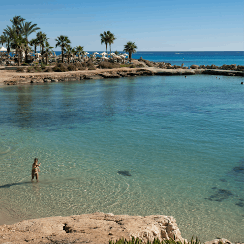 Spend the day splashing around in the turquoise waters at Nissi Beach