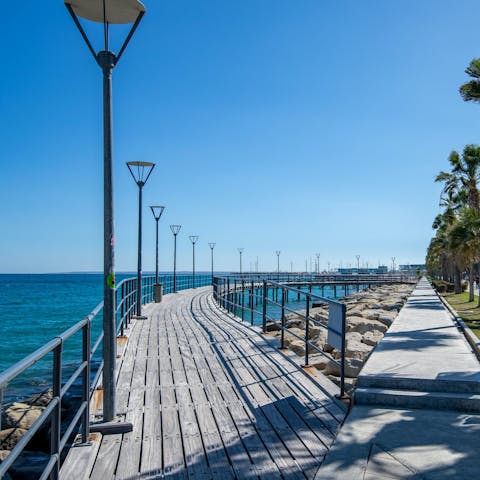 Enjoy a stroll along Limassol Promenade in the sunshine