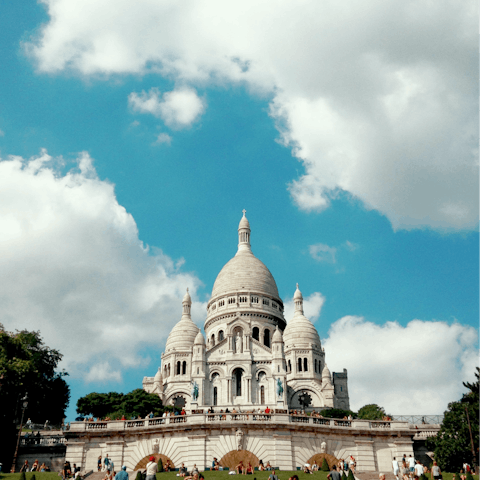 Visit the iconic Basilique du Sacré-Cœur, an eleven-minute walk away