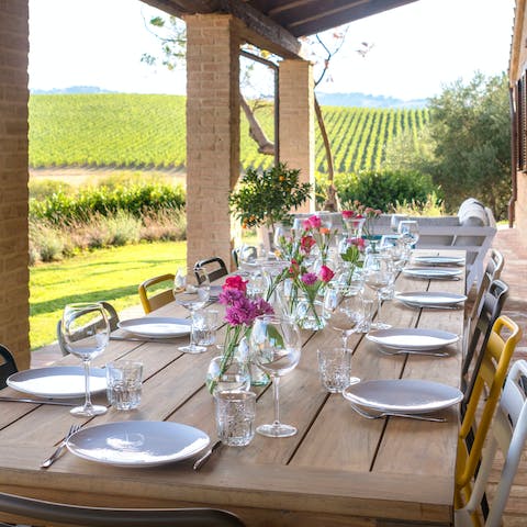 Gather guests together for a banquet on the table on the terrace