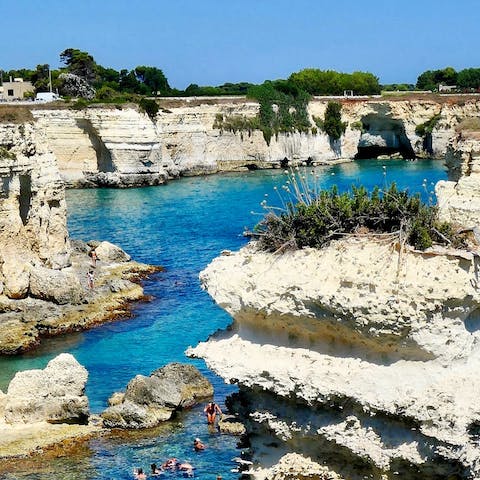 Visit the caves and cliffs of Ciolo