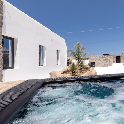 Soak up the glorious sunshine as you soak in the private Jacuzzi