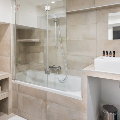 Treat yourself to a restorative soak in one of the three bathtubs in the apartment