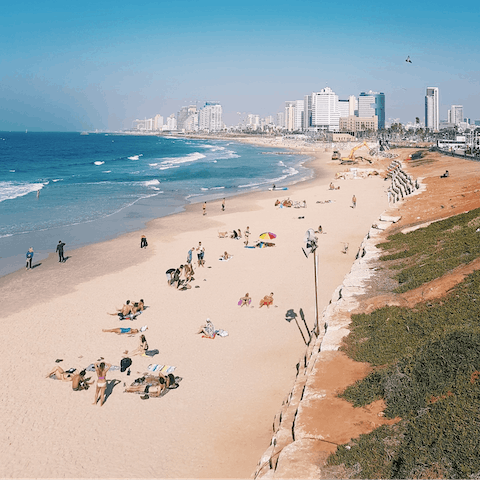 Walk or drive just a kilometer to sandy Aviv Beach
