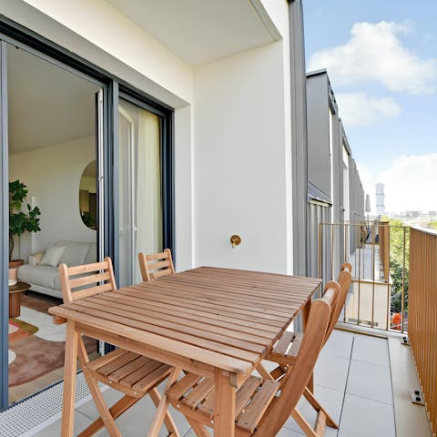 Gather on the balcony for drinks in the evening sun