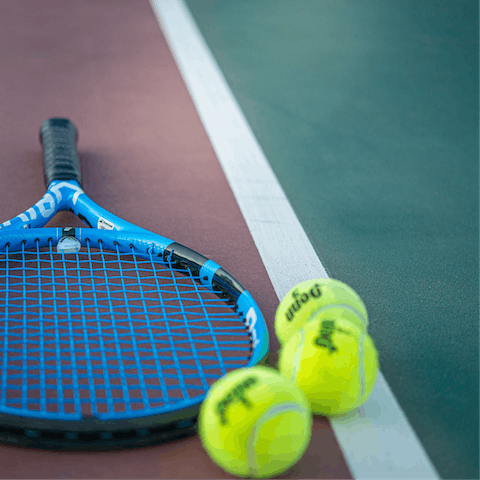 Play a game of doubles on the nearby tennis courts