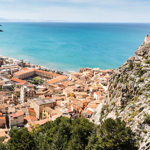 Drive seventeen minutes to Cefalù and fall in love with the ancient village by the sea