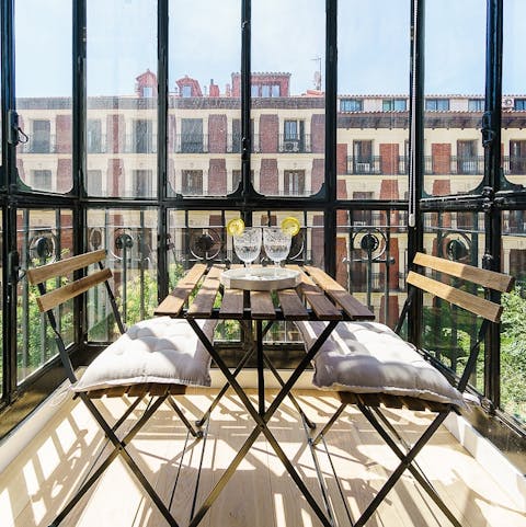 Enjoy your morning coffee with a view on the enclosed balcony