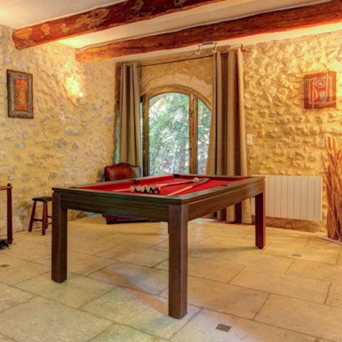 Escape the midday sun with an indoor game of snooker
