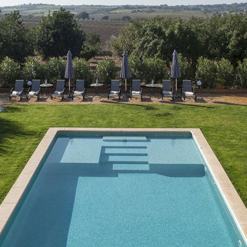 Spend days in the pool, cooling off from the Spanish sun