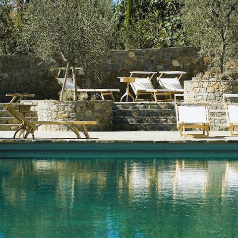 Relax in the golden sunshine by the shared pool