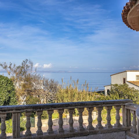 Wake up to stunning sea views from the main bedroom's private balcony