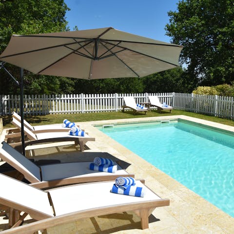 Spend blissful afternoons relaxing by the heated pool 