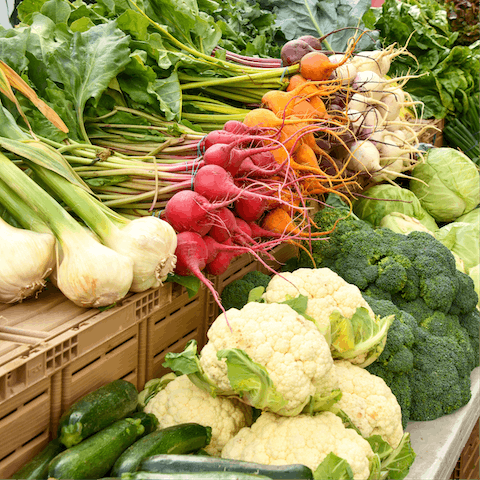 Shop for fresh produce at the Highland Farmer's Market held every Sunday, a four-minute drive away