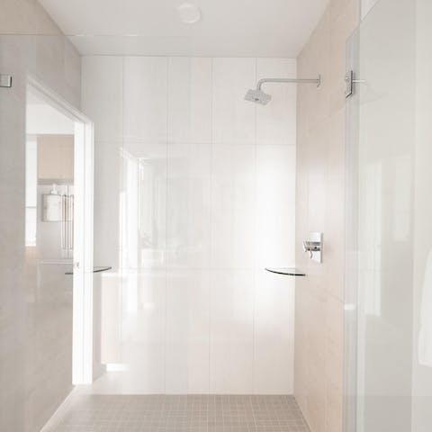 Start mornings with a relaxing soak in the bathroom's large shower