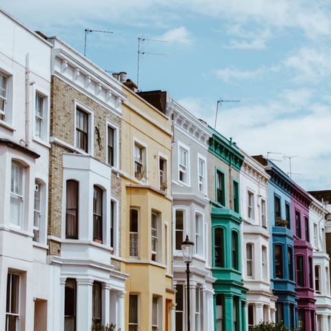 Shop for antiques and admire the colourful houses in Notting Hill, thirty minutes on foot