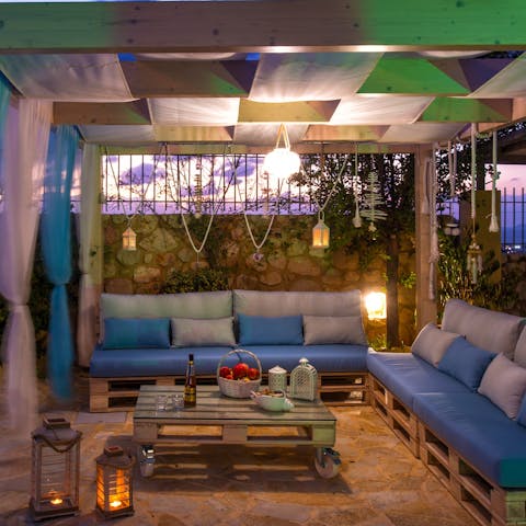 Sip ice-cold ouzo as the sun goes down in your private courtyard