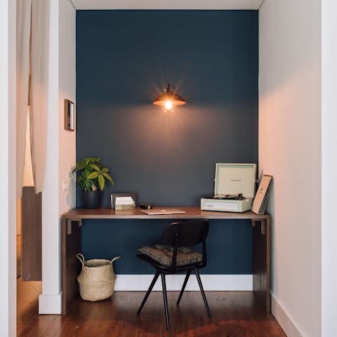 Catch up on work at the chic desk space while listening to some tunes on the record player