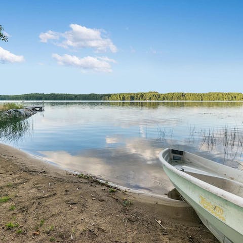 Take the row boat out on Lake Saimaa and feel at one with nature