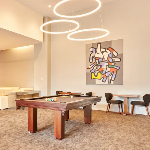 Relax with a few games of pool in the building's shared space
