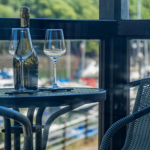 Soak up harbour scenes over a glass of something chilled on the balcony