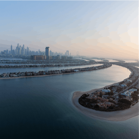 Enjoy exploring Palm Jumeirah's exclusive beaches, only twelve minutes away by car