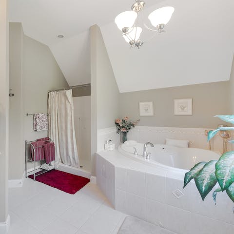 Treat yourself to a relaxing and indulgent bubble bath in this beautiful jacuzzi tub 