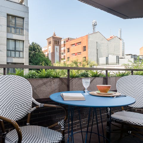 Start the day with fresh coffee on the private balcony