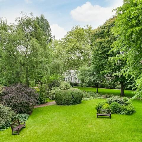 Find calm as  you overlook the leafy, green communal garden