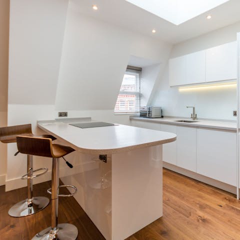Start the day with coffee and pastries on the super-stylish breakfast bar
