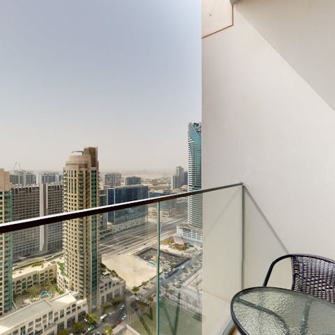 Start mornings with a coffee on the balcony with sky-grazing views