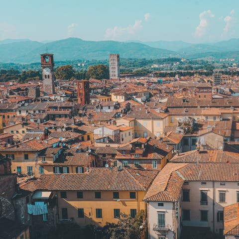 Explore the cobbled streets of Lucca, a nine-minute drive from home