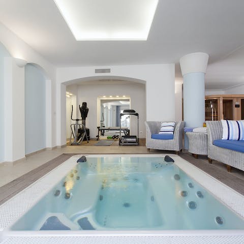 Make full use of the gym equipment before relaxing in the Jacuzzi afterwards